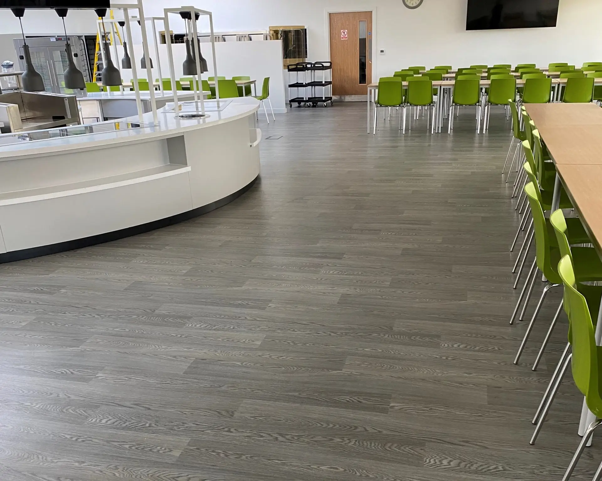 Image shows new flooring at Derby high school with the canteen counter ready to serve meals