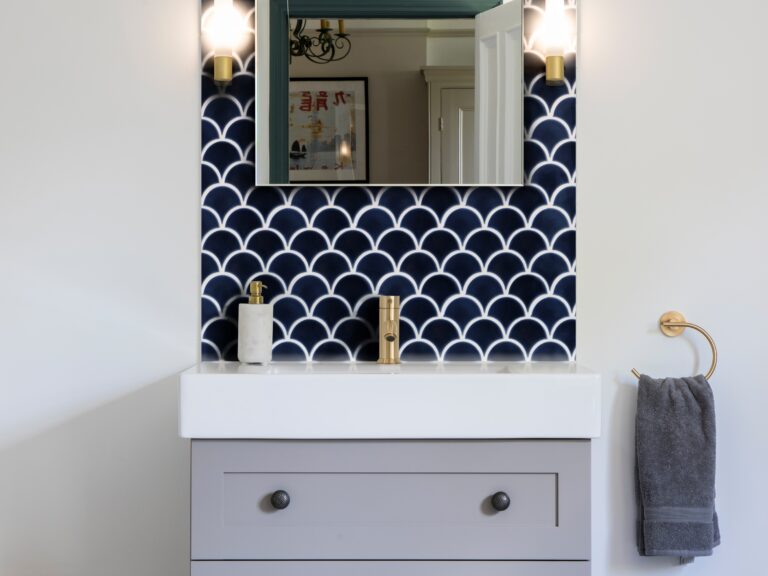 image of a vanity unit with scalloped porcelain tiles in Navy made by Ca'Pietra