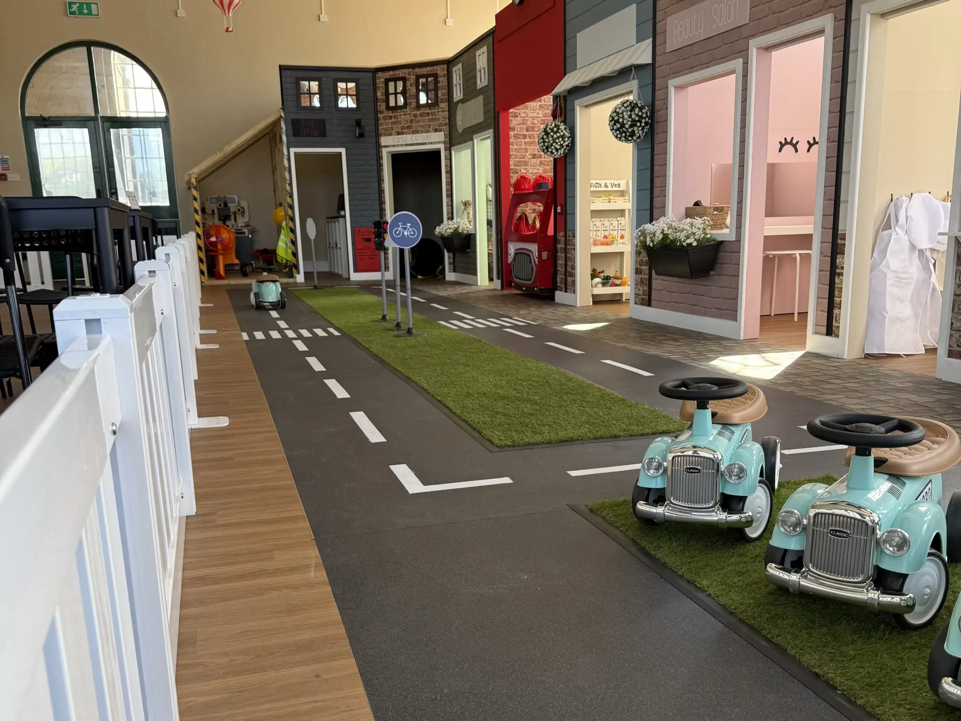 Childrens play village flooring installation in Belper with cobbled vinyl streets and shop areas